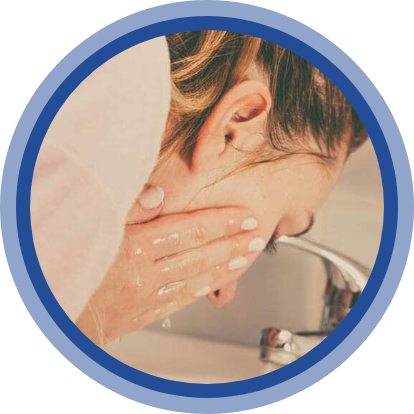 Young women washing her face